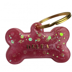 Porte clef  – médaillon en forme d&rsquo;os en résine